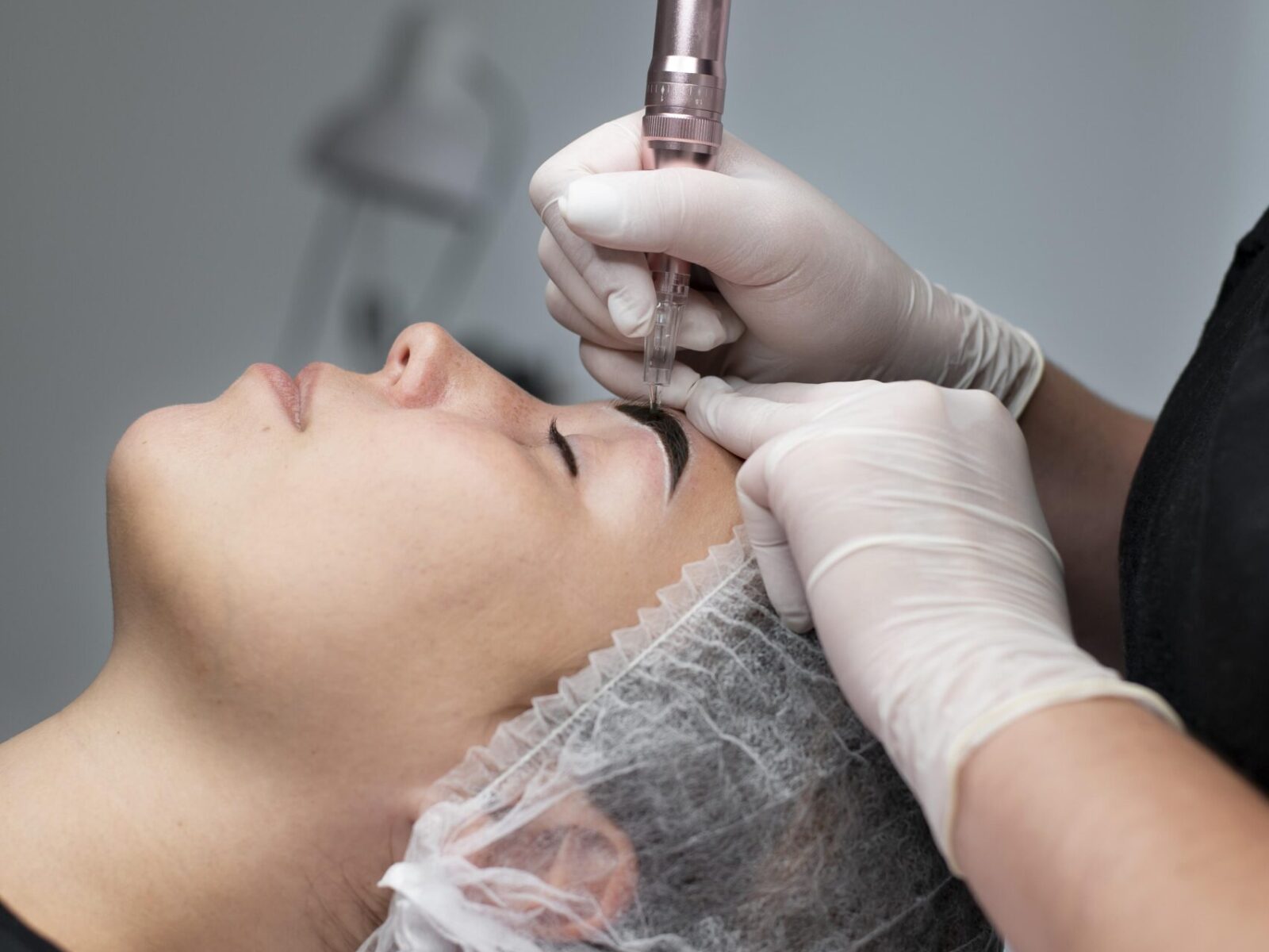 young-woman-going-through-microblading-treatment